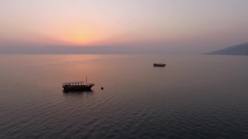 A body of water with two boats in it