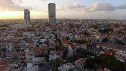A dense city at sunset
