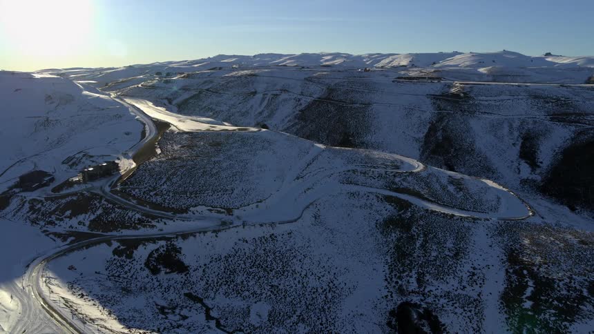 Aerial view of the snow covered slopes of SHPG at evening