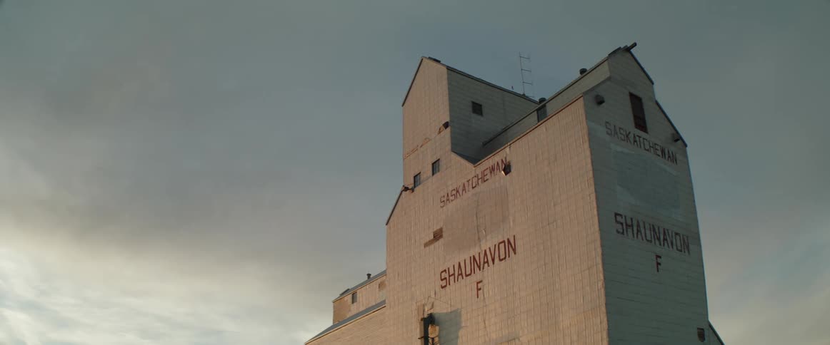 Clouds moving over a granary