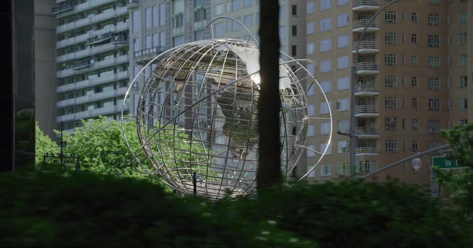 A large art sculpture is in a city