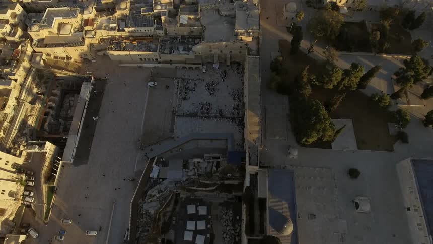 Buildings below have some trees around them