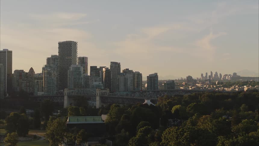Two clusters of skyscrapers and bridges displayed in downtown Vancouver BC