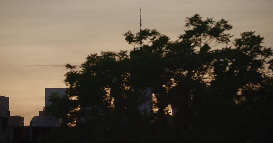 One world trade center in new york city seen from a moving vehicle at evening