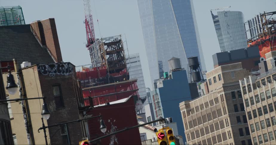 Office buildings and constructions cranes in a city