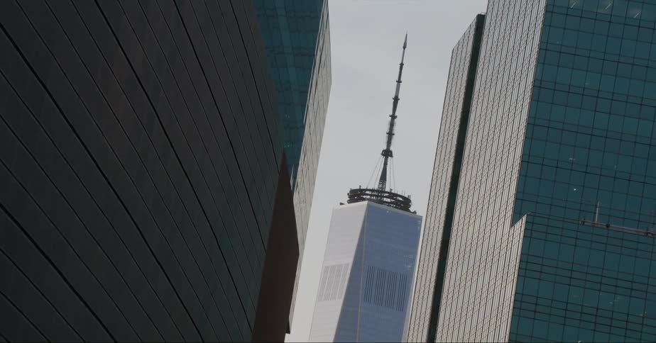 Exterior view of office buildings and skyscraper with spire in the city