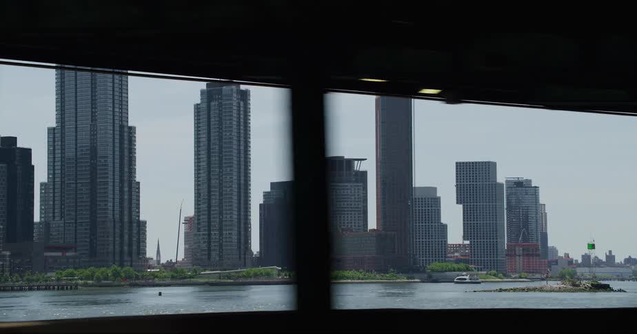 Numerous skyscrapers line the waterfront of this downtown metropolitan area