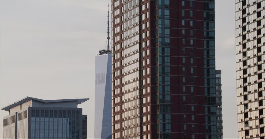 One world trade center in new york city seen from a moving vehicle at evening