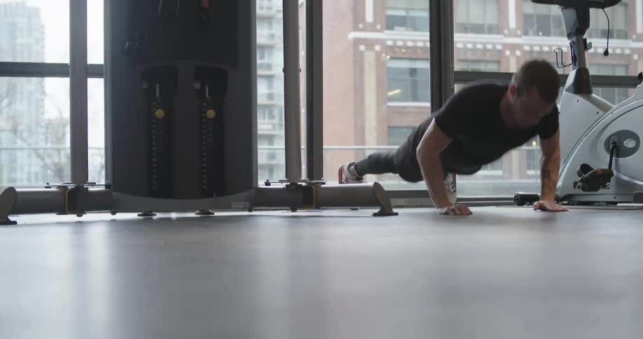 A man is doing push ups