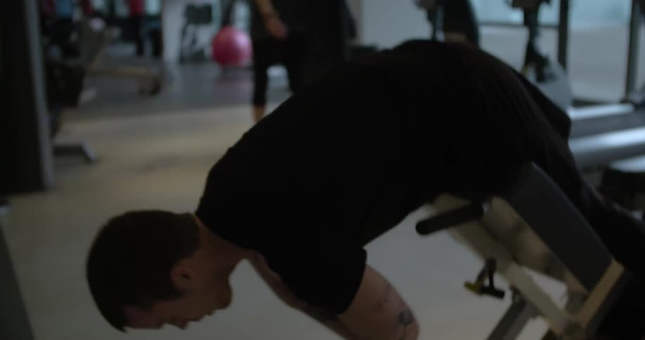 A man is working out in a gym