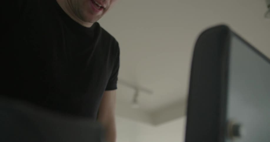 A man exercises at a gym