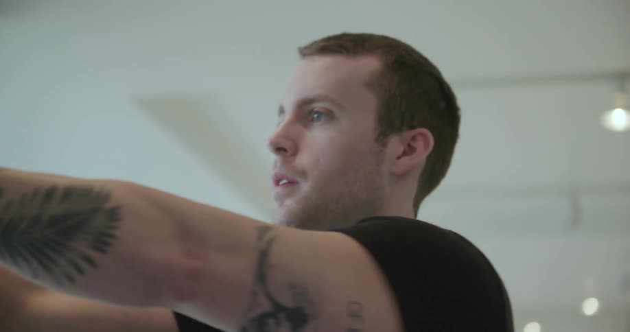 A man exercises at a gym