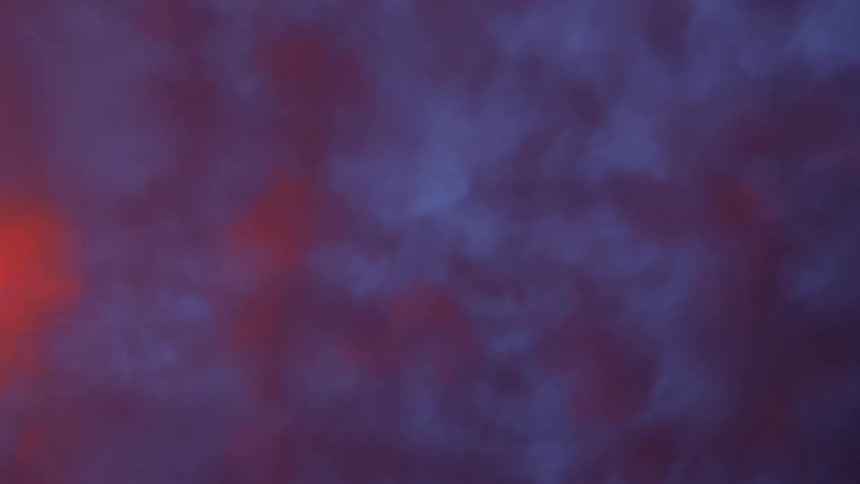 A cloudy lavender substance floats in a pink atmosphere