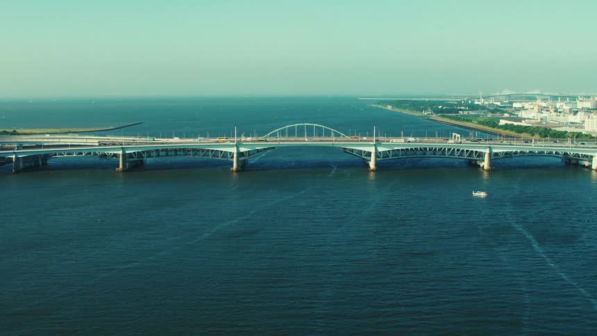 Vehicles travel over the bridge