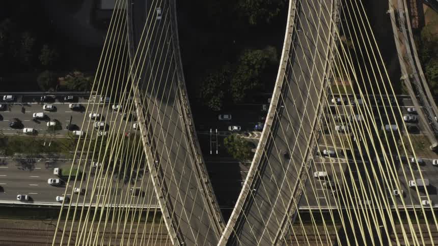 Heavy traffic travels down multiple lanes of an interstate