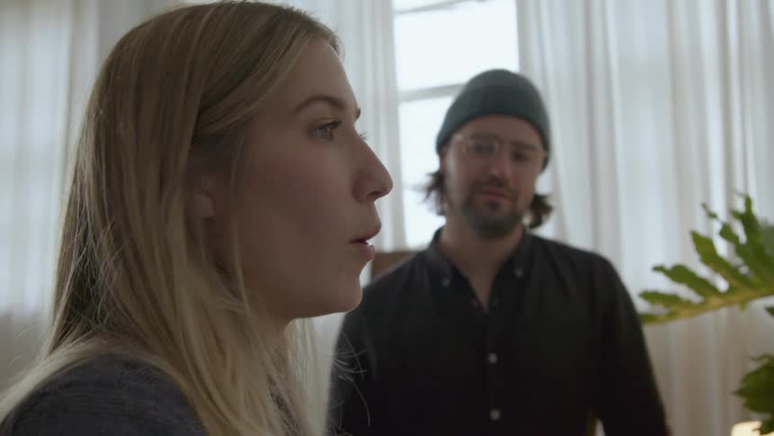 A man and woman are talking