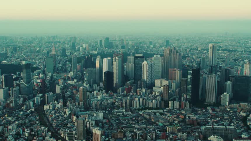 An aerial view of large buildings in a city