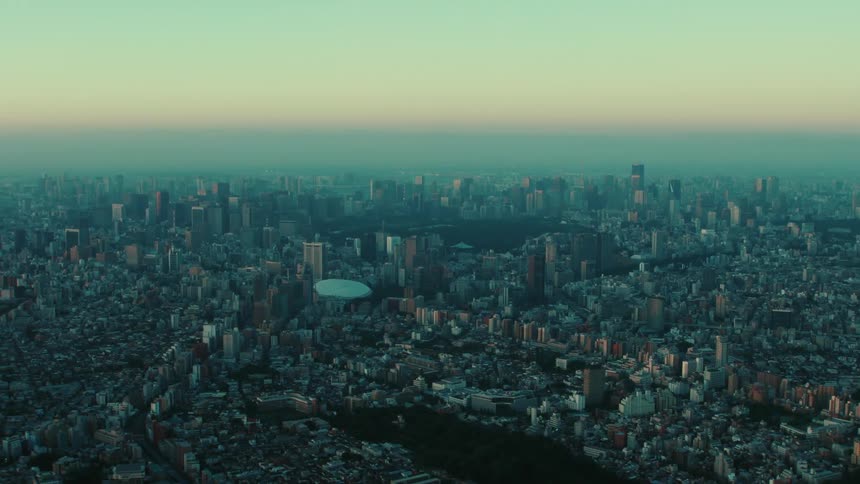 An aerial view of buildings and skyscrapers in a city