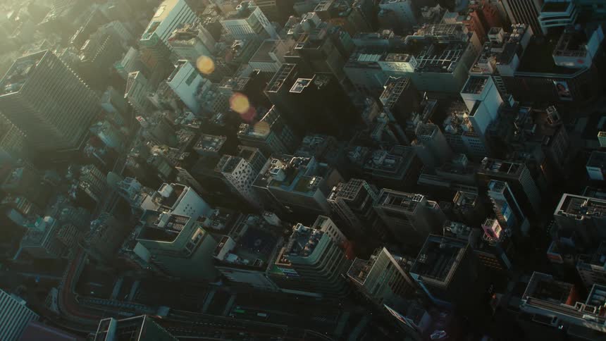 An aerial view of buildings and skyscrapers in a city