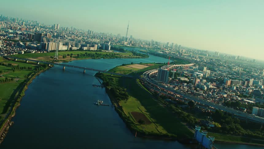 An aerial view of a city with a river