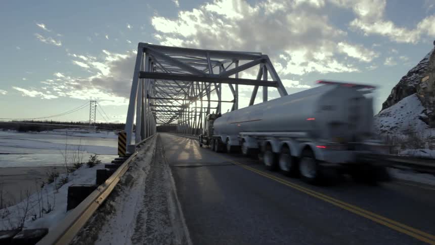 A tanker truck crossing a bridge