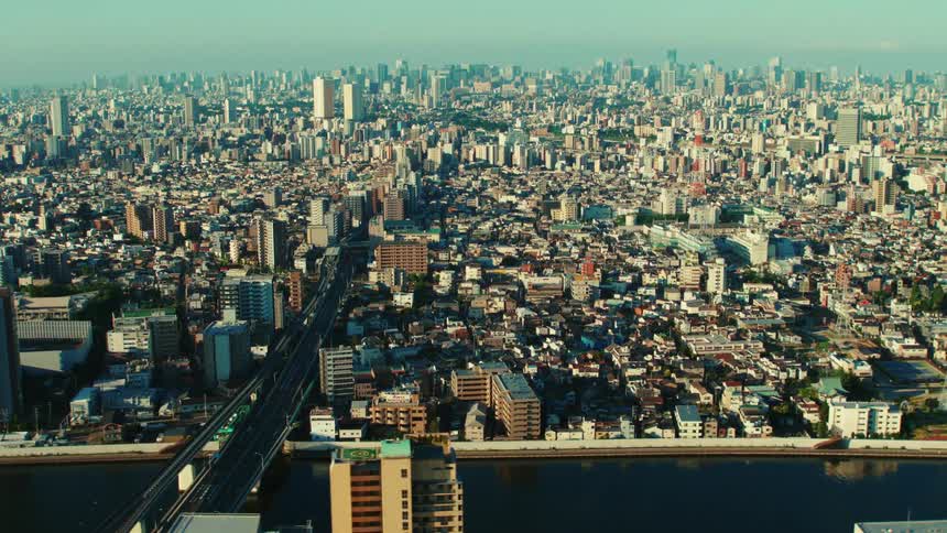 An aerial view of a city with tall buildings