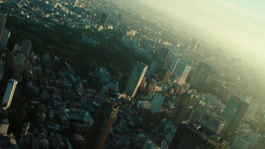A dense city is covered in thick smog