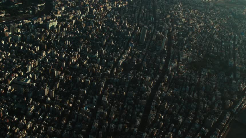 A shadow covers the city