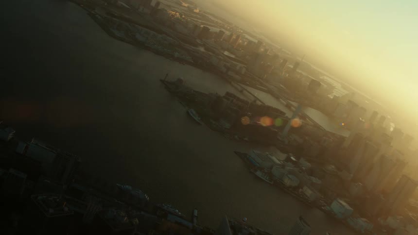 The sun is rising on the city