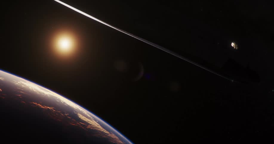 The sun is visible between the space shuttle and the curve of the earth