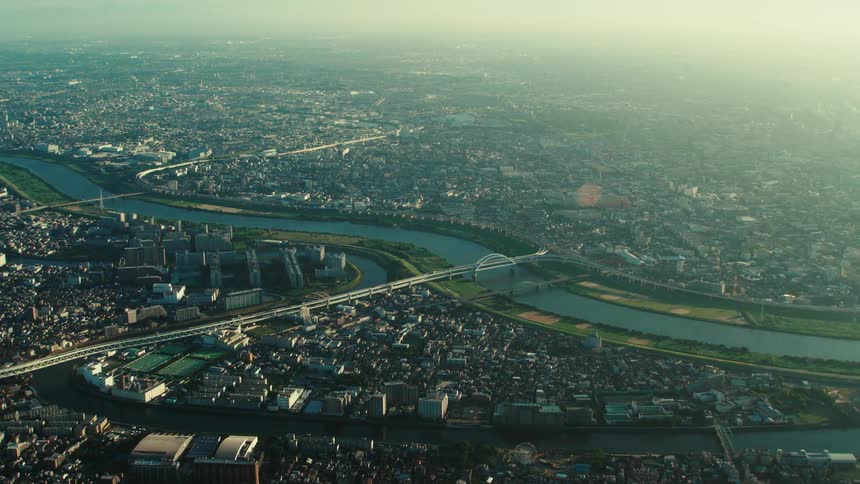 An aerial view of a large city with a river running through it
