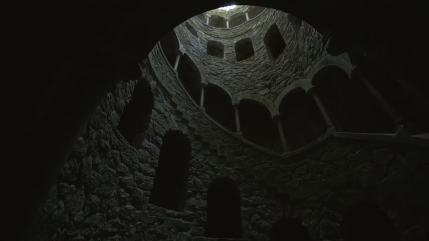 A tight stone stairwell