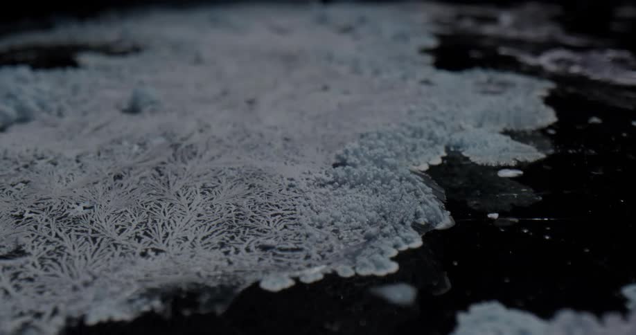 The surface is covered with frost