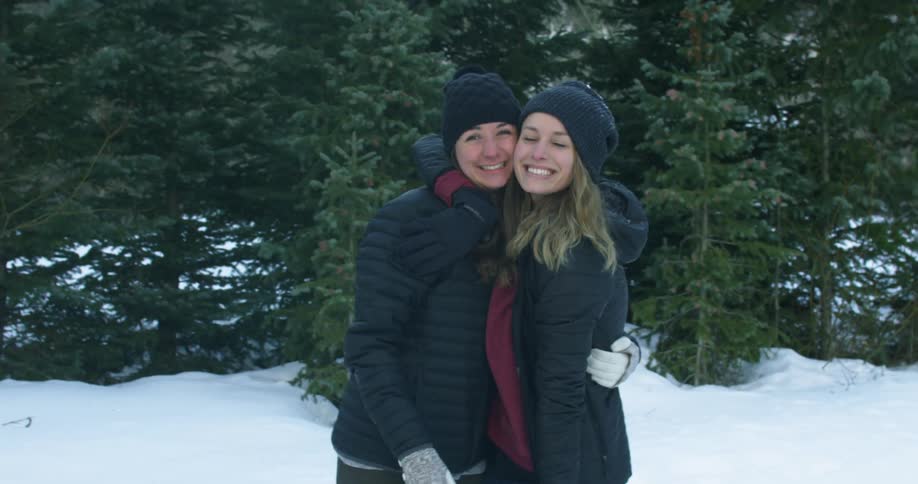 Two Girls Hugging and Smiling