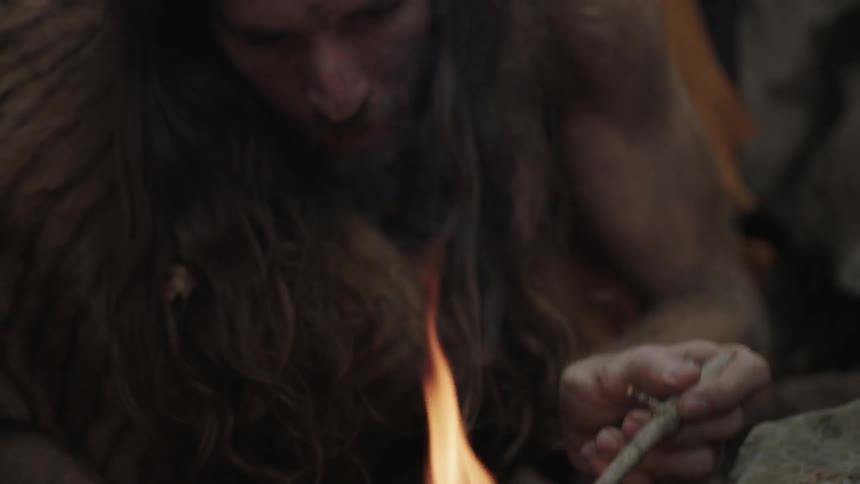 A man starts a fire