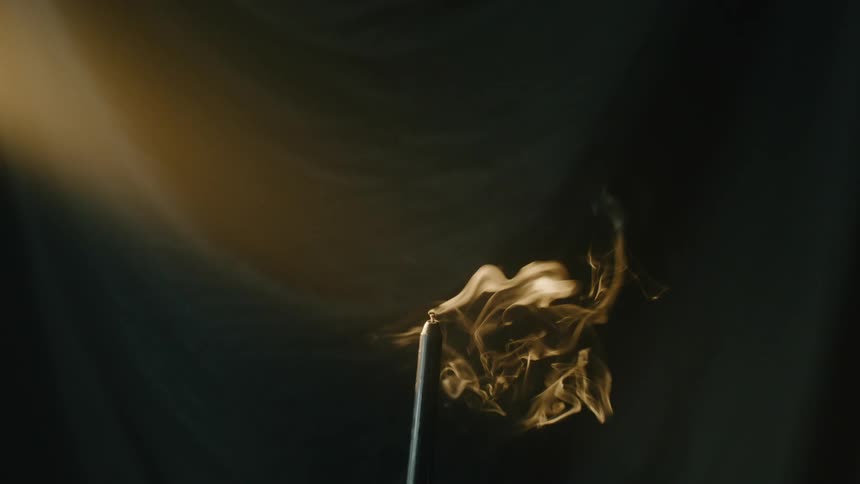 The flame on a candlestick burns out