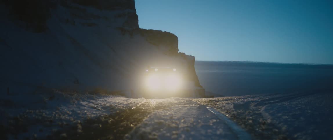 A view of a truck driving outdoors