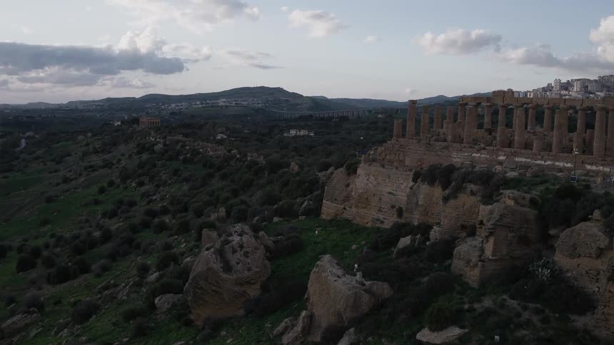 Ancient ruins on a green hill