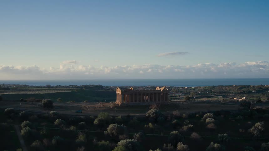 An ancient building on a nearly clear day