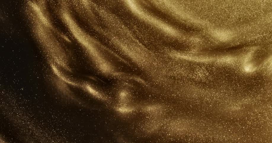 Gold glitter moves and shimmers