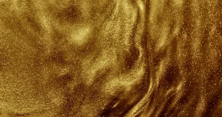 Gold sand spins and the center vibrates about as the outer rings form waves