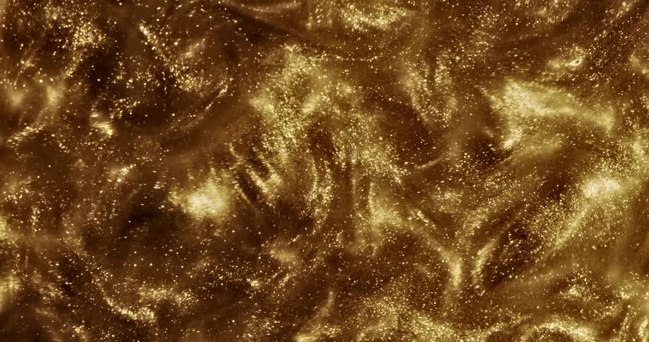 A gold cloud of dust rushes in then slowly breaks up