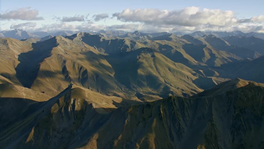 An aerial view of mountains in the wilderness