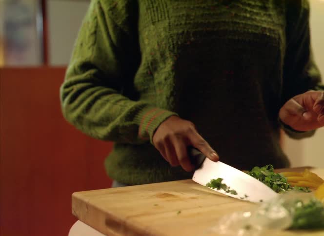 A person is preparing food in their kitchen