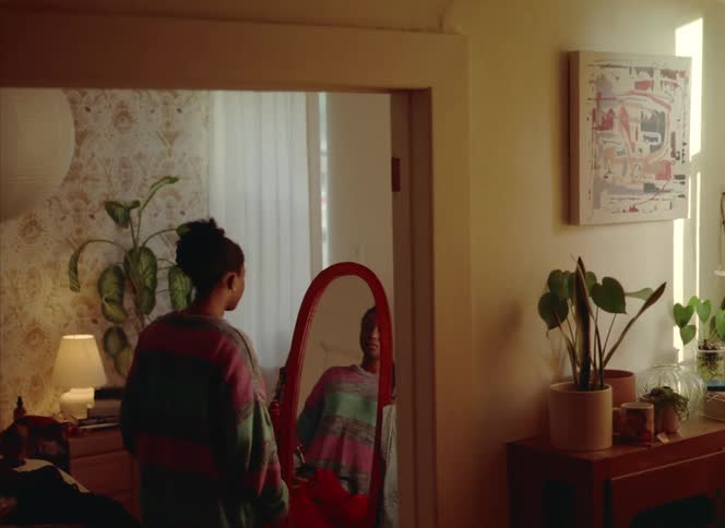A woman looking at a dress