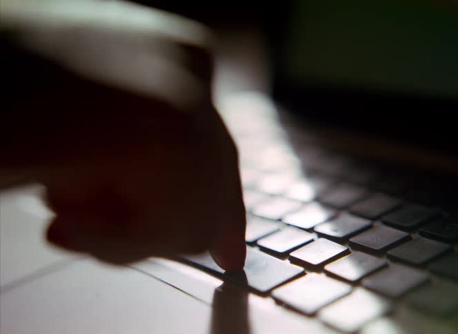 Person tries typing on apple laptop then slams laptop closed