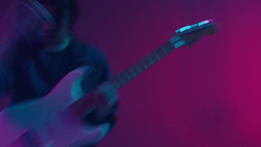 Person playing guitar