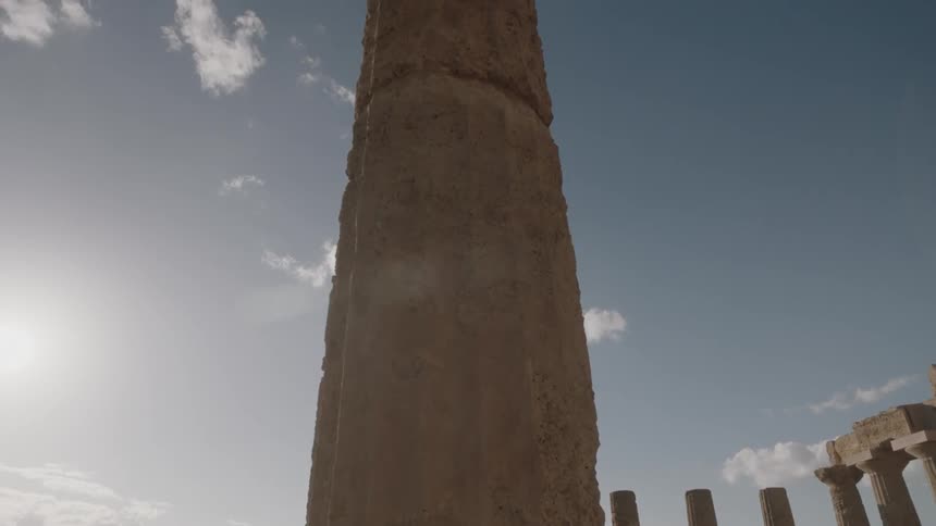 Weathered stone pillars on a sunny day