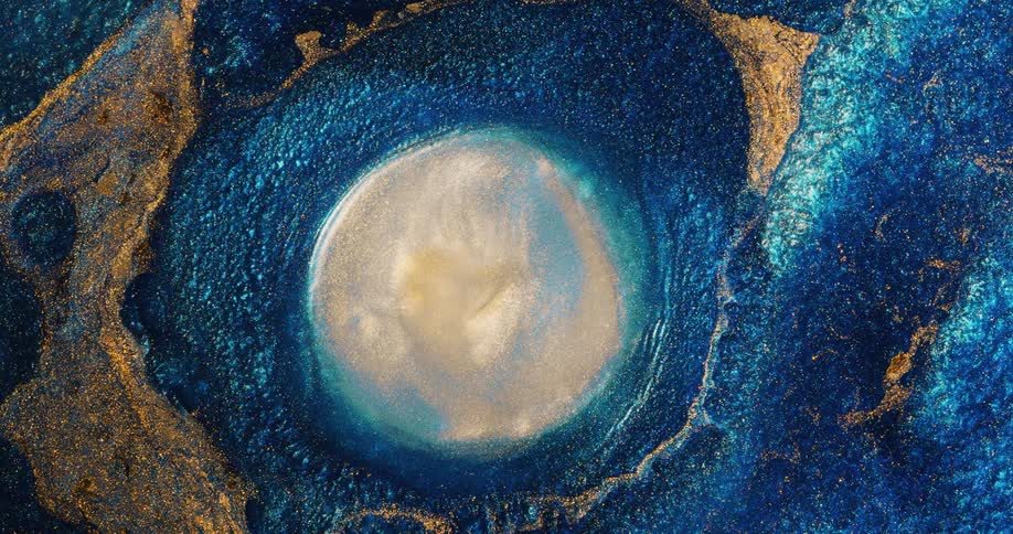 A blue and orange glittery environment moves as a drop falls in and then a bubble grows from the center rippling and growing into a white sphere before shrinking back down