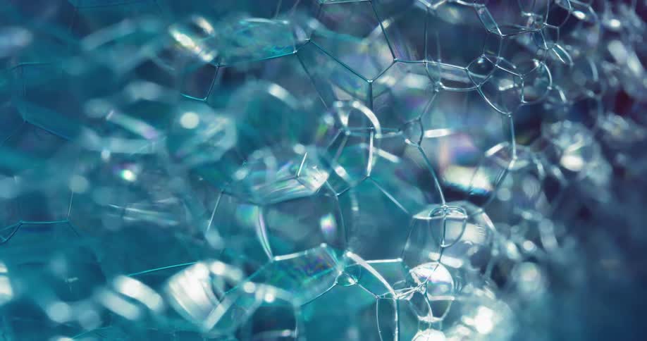 A bubble substance reflects as it moves and parts connect and disconnect from their sides